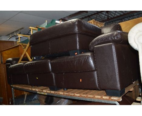 A BROWN LEATHER THREE SEATER SETTEE, and a pouffe (2)