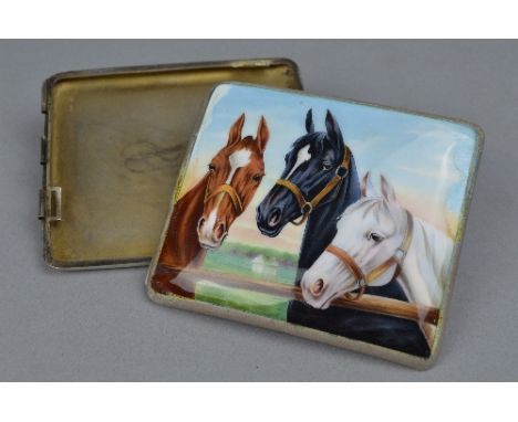 A DISTRESSED SILVER AND ENAMELLED DECORATED WITH THREE HORSES CIGARETTE CASE