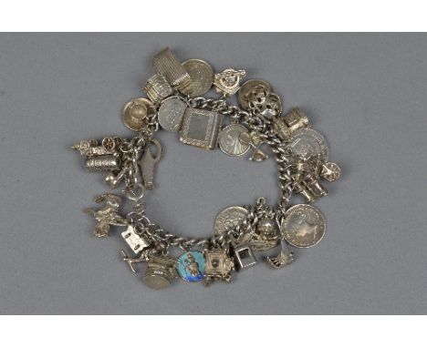 A SILVER CHARM BRACELET, approximate weight 87.5 grams