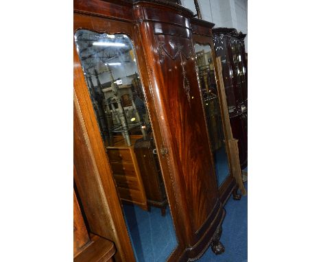 A VICTORIAN MAHOGANY TWO PIECE BEDROOM SUITE, comprising of a large  mirrored, two door wardrobe with a carved panel centre, 