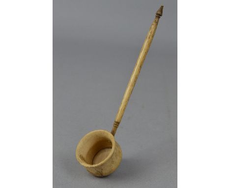 AN EARLY 19TH CENTURY BONE TODDY LADLE, cauldron shaped bowl on a turned handle, length approximately 16cm