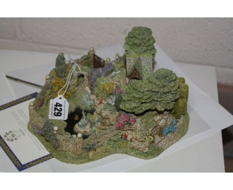 A BOXED LIMITED EDITION LILLIPUT LANE SCULPTURE, modelled as 'Leonora's Secret' No.2448/2500 (with certificate and leaflet)