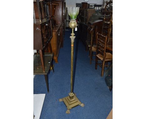 A VICTORIAN BRASS TELESCOPIC OIL LAMP STAND, on a square stepped base and claw feet, together with a frosted shade