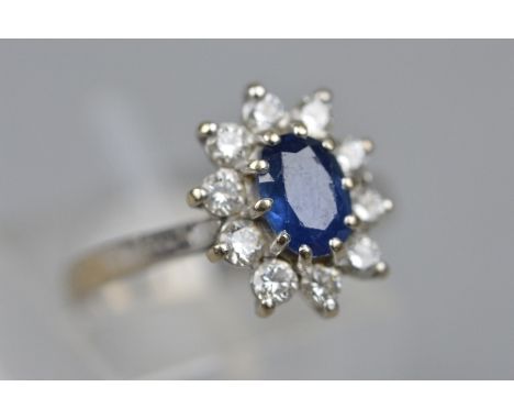 AN 18CT SAPPHIRE AND DIAMOND RING, ring size K, approximate weight 4.1 grams