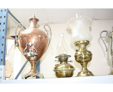 A VICTORIAN NEO CLASSICAL STYLE TWIN HANDLED SAMOVAR OF URN FORM, together with a brass based oil lamp and another brass oil 