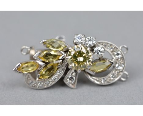 A MODERN DIAMOND AND CITRINE DOUBLE ROW NECKLACE CLASP, centring on a principle modern round brilliant cut diamond, estimate 