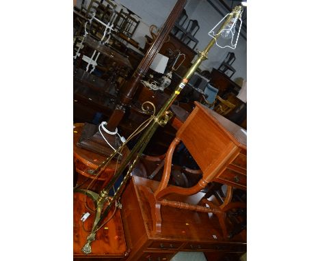 A BRASS TELESCOPIC STANDARD LAMP, on triple legs