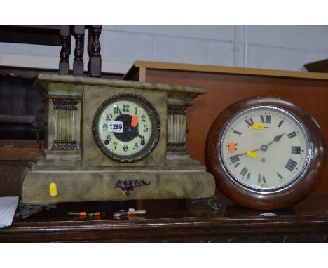 A GREEN PAINTED MANTEL CLOCK, with brass moulding, enamel dial and Arabic numerals, together with a small oak circular railwa