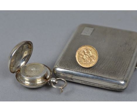 A SILVER CASE, a silver sovereign case and a 1912 half sovereign