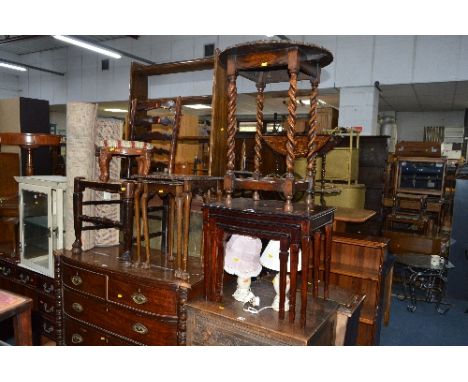 A MODERN MAHOGANY NEST OF THREE TABLES, a walnut nest of tables, an oak occasional table, an oak ladder back chair, footstool