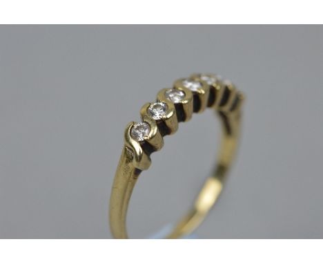 A 9CT DIAMOND SET RING, ring size M, approximate weight 2.7 grams