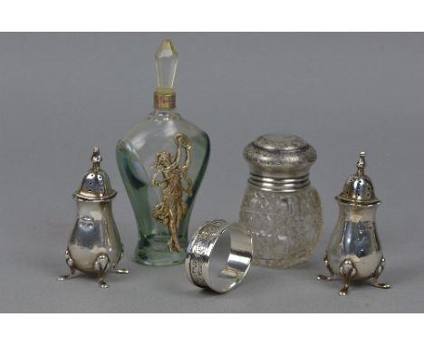 A PAIR OF SILVER SALTS, silver napkin ring, a silver topped perfume bottle (5)