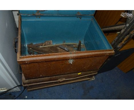 TWO TIN TRUNKS, containing some tools