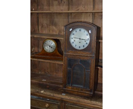 A MID 20TH CENTURY OAK WALL CLOCK, and a mantle clock (2)