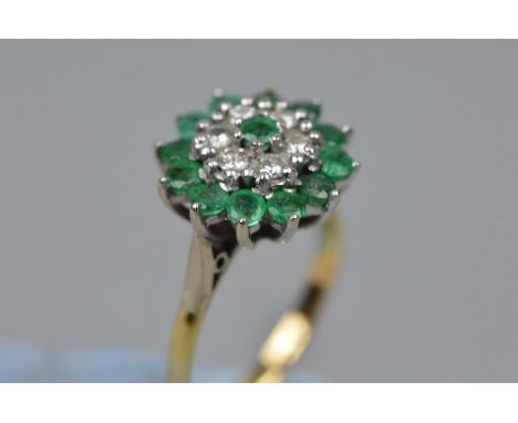 AN 18CT DIAMOND AND EMERALD CLUSTER RING, ring size M, approximate weight 4.8 grams