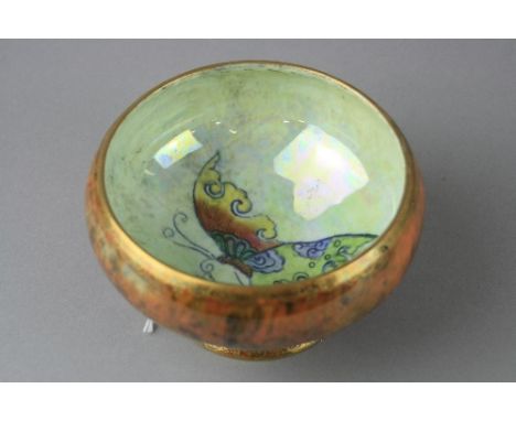 A WEDGWOOD BUTTERFLY LUSTRE PEDESTAL BOWL, pattern number Z4830, single butterfly to the interior, the exterior with a band o