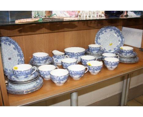 ROYAL DOULTON TEASET, blue and white florally decorated, comprising two cake plates, milk jug, sugar bowl, twelve cups, twelv