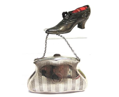 AN EARLY 20TH CENTURY SILVER CARTOUCHE SHAPED PURSE  with engine turned bands, a round reserve with script initials 'CS' and 