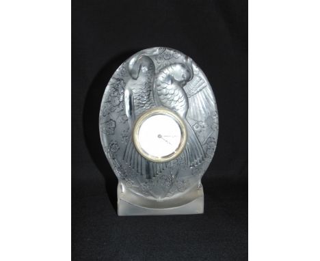 A FRENCH FROSTED GLASS CLOCK  in the manner of Lalique/Sabino, relief moulded with pair of parrots, faintly marked to reverse