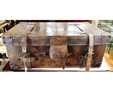 A LARGE VINTAGE LEATHER TRAVELLING TRUNK  88cm wide 53cm deep 36cm high