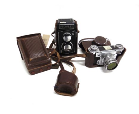 A HACOFLEX TWIN LENS REFLEX CAMERA  with a Tri-Lausar 1:3.5 f=8cm viewing lens and a Tri-Lausar Anastigmat 1:3.5 f=8cm taking