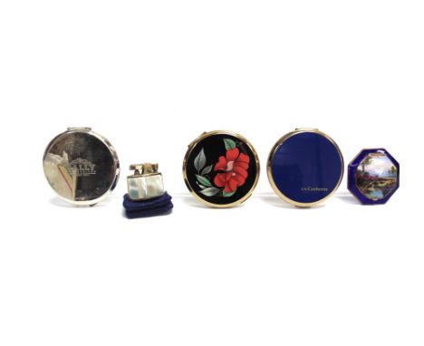 A COLLECTION OF COMPACTS comprising; a Continental gilt metal and polychrome enamelled compact, the hinged cover depicting a 