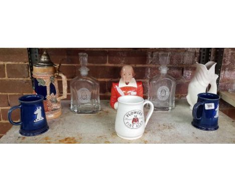 SHELF WITH DARTMOUTH GURGLE JUG, ADVERTISING DECANTERS & MUGS & A WILLIAM SHAKESPEARE FIGURE