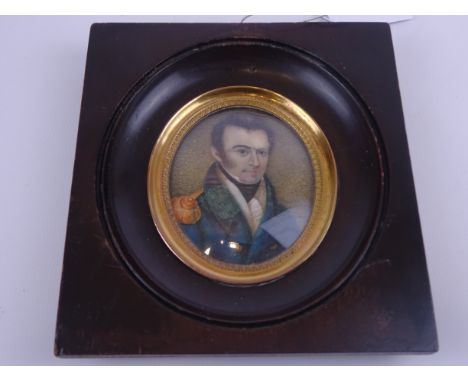 Head & shoulder miniature oval portrait of a Regency Naval Officer, watercolour on ivory, in ebonised frame with gilt metal s