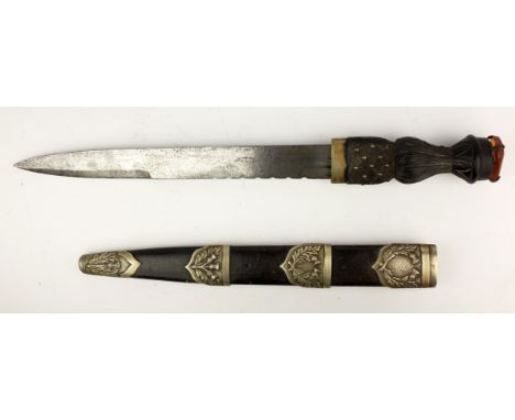 20th century skean dhu with 30cm scallop back part double edge steel blade, the ebony baluster grip carved with basket weave 