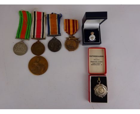 British War Medal to Gnr W D Whittaker R A in box of issue, Special Constabulary Medal to same, Defence Medal, XXX Corps & Du