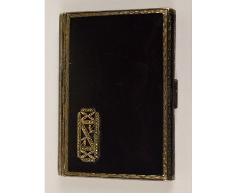 An Art Deco silver gilt and black enamel decorated cigarette case of rectangular form, the front set with marcasite plaque, w