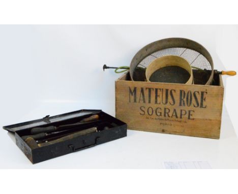A group of various tools including three planes, chisels, small oil lamp, etc, also two large sifters and a tin cased set of 
