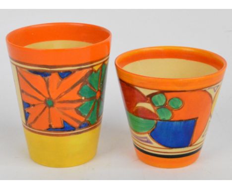 Two Wilkinson Pottery Clarice Cliff "Fantasque" beakers, one decorated in the "Melon" pattern, the other with stylised flower