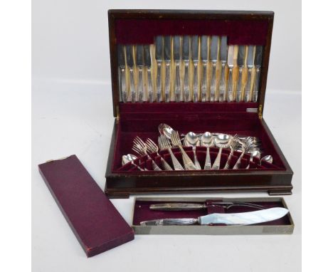 A cased canteen of electroplated cutlery by Elkington & Company, a pair of matching carving tools and soup ladle.