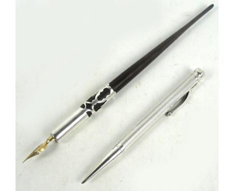 An Elizabeth II hallmarked silver propelling pencil with overall engine turned decoration and rectangular vacant cartouche, S