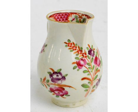 An 18th century sparrow beak jug with painted floral decoration, previously attributed to Worcester/Caughley, c.1770, height 