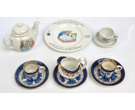 Two Booths "Real Old Willow" pattern decorated coffee cans and saucers, a spare saucer and a cream jug, also a Wedgwood "Pete