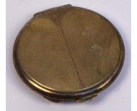 An Elizabeth II hallmarked silver overall engine turned decorated powder compact with engraved floral motifs to the hinged li