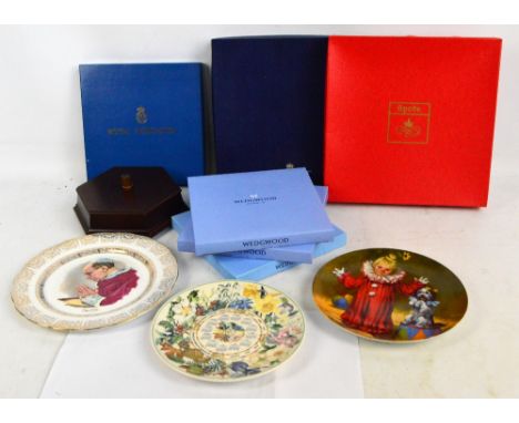A collection of predominantly boxed collectors' plates including a Royal Worcester Lester Piggott plate, Wedgwood Royal Comme