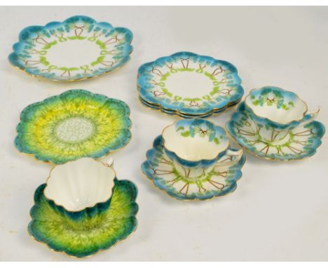Two late 19th century Wileman & Co Foley china trios, pattern 7069, with two further plates, also another Foley Art Nouveau t