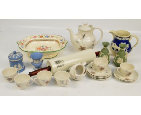 A Royal Doulton "Tumbling Leaves" pattern decorated six setting coffee set comprising coffee pot, six coffee cans and saucers