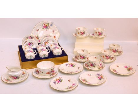 A Royal Crown Derby "Posies" pattern decorated tea set comprising six trios, a cream jug, sugar bowl and a sandwich plate, an