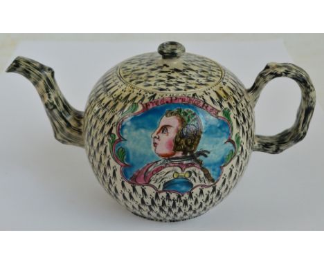 A Staffordshire salt glazed stoneware "King of Prussia" teapot and cover, c.1760, length 19cm (af). CONDITION REPORT: Extensi