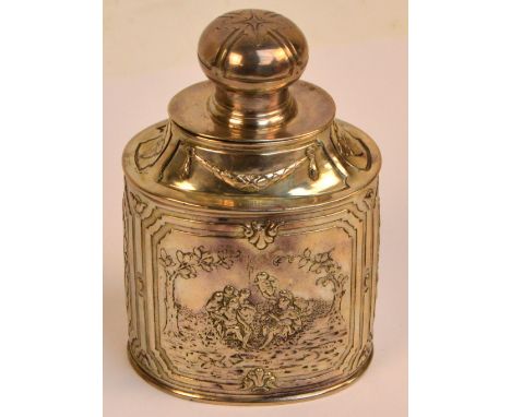 A late 19th/early 20th century German silver tea canister of oval form, embossed with a mythological figural scene with each 