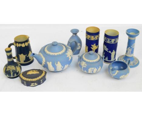 A quantity of Wedgwood and Adams blue jasper dip relief moulded item including a candlestick, tea-pot, jugs etc.