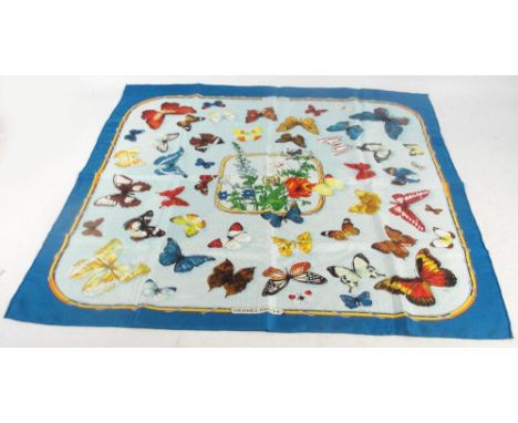 HERMES; a silk scarf decorated in Farandole butterflies pattern on blue colourway, after design by Caty Latham, designed c.19