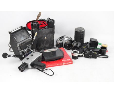 A vintage Nizo 136 cine camera, a Canon AE-1 camera, a Yashica lamp, a cased pair of Prinz 10 x 50 binoculars, etc.