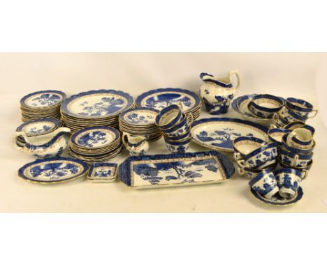 A Booths "Real Old Willow" pattern decorated dinner and teaware comprising ten dinner plates, seven smaller examples, fourtee
