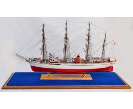 A Nipponmaru 1/100 scale model of a four masted vessel, in glazed case, length of case 115cm.