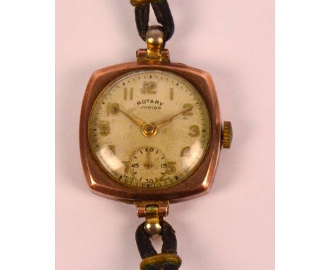 ROTARY; a 1940s "Junior" 9ct rose gold cased manual wind lady's cocktail wristwatch, the circular dial set with applied Arabi